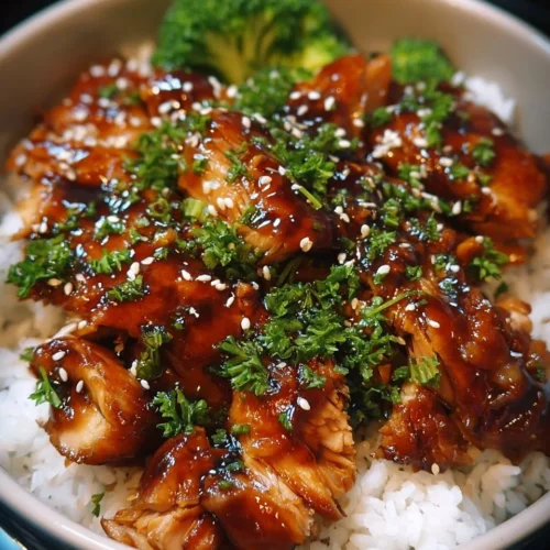 Dump and Go Crockpot Teriyaki Chicken 2 Crockpot teriyaki chicken dish topped with green onions and sesame seeds