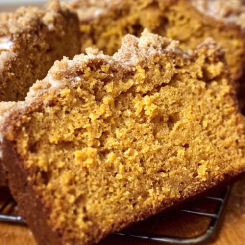 Grandma's Pumpkin Bread with Streusel 2 Grandma’s Pumpkin Bread with Streusel on a wooden table