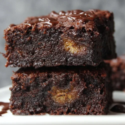 Banana Brownies 3 Deliciously moist banana brownies topped with chocolate chips.