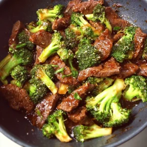 Gluten-Free Beef and Broccoli 3 Gluten-free beef and broccoli dish served with rice on a plate