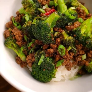 Ground Beef and Broccoli Stir Fry 3 Ground beef and broccoli stir fry served in a colorful bowl