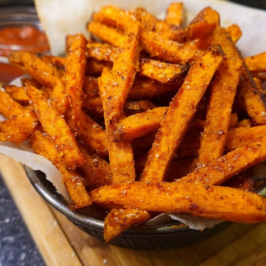 Crispy baked sweet potato fries served in a bowl