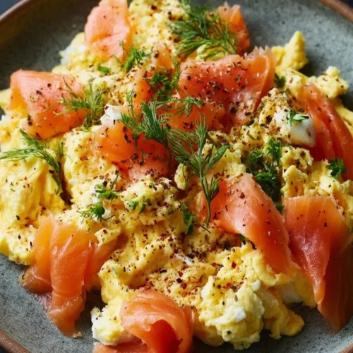 Egg Scramble with Smoked Salmon 2 Delicious egg scramble with smoked salmon served on a plate
