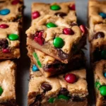 Extra Soft & Chewy M&M Cookie Bars 2 extra soft chewy mm cookie bars 2025 12 06 180400 150x150 1