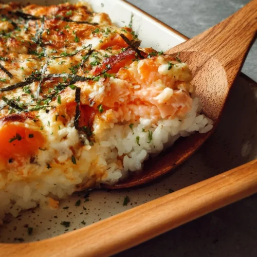 Creamy Salmon Sushi Bake 2 Delicious creamy salmon sushi bake topped with seaweed and rice