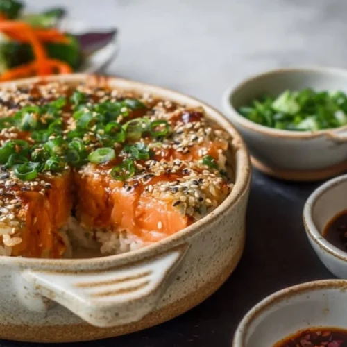 Delicious Salmon Sushi Bake served hot with toppings and garnishes