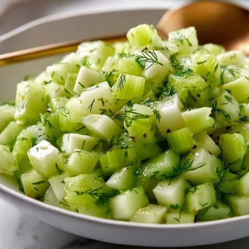 Tasty Celery Salad with Dill 2 Tasty celery salad with dill served in a colorful bowl.