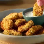 Fried mini pickles served as a crispy appetizer