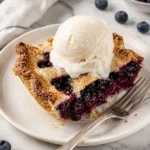 Delicious fresh blueberry pie with a golden crust and juicy blueberries