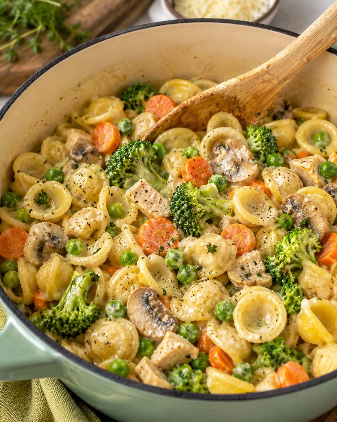 Creamy chicken pasta dish with fresh vegetables